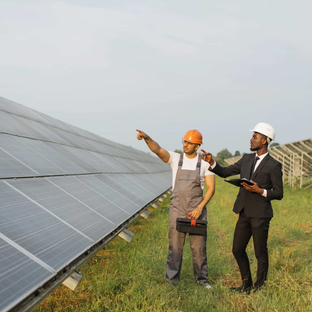 Sustainable Living: Tips for a Greener Lifestyle with GreenGlow businessman and technician examining solar panels 2022 04 27 02 11 08 utc
